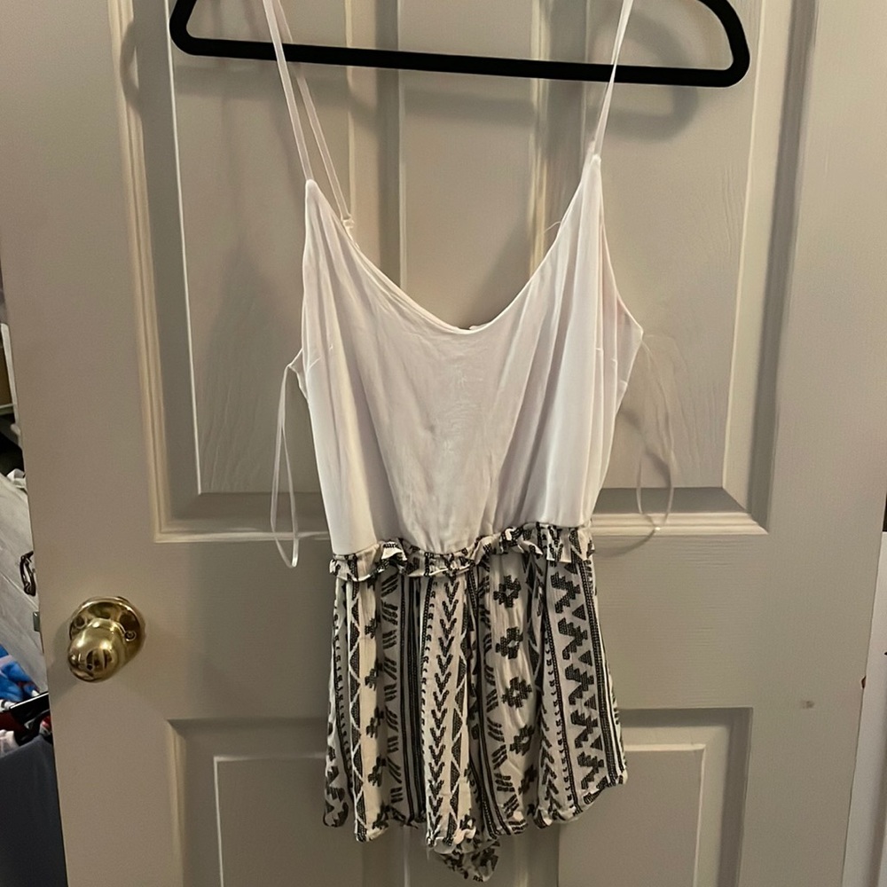 Barely worn white and tan romper.